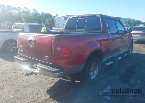 2002 Ford F-150 Lariat/Xlt z USA, uszkodzony, nr VIN 1FTRW07LX2KD47266